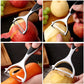 Économe en inox épluchant pomme, pomme de terre et carotte